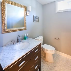 Half Bathrooms for your basement | BasementRemodeling.com ideas