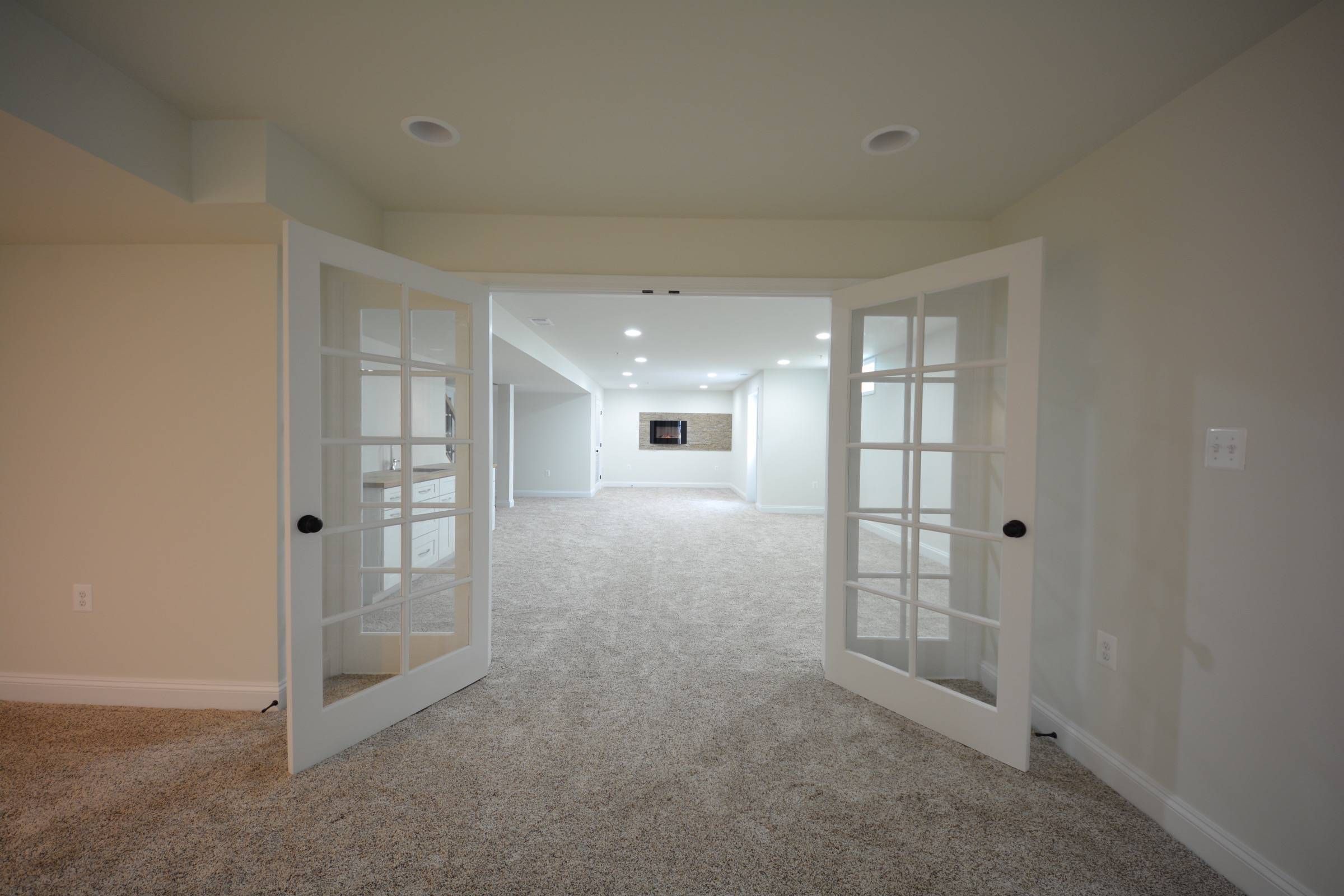 Beautiful pair of glass doors providing comfortable room separation.