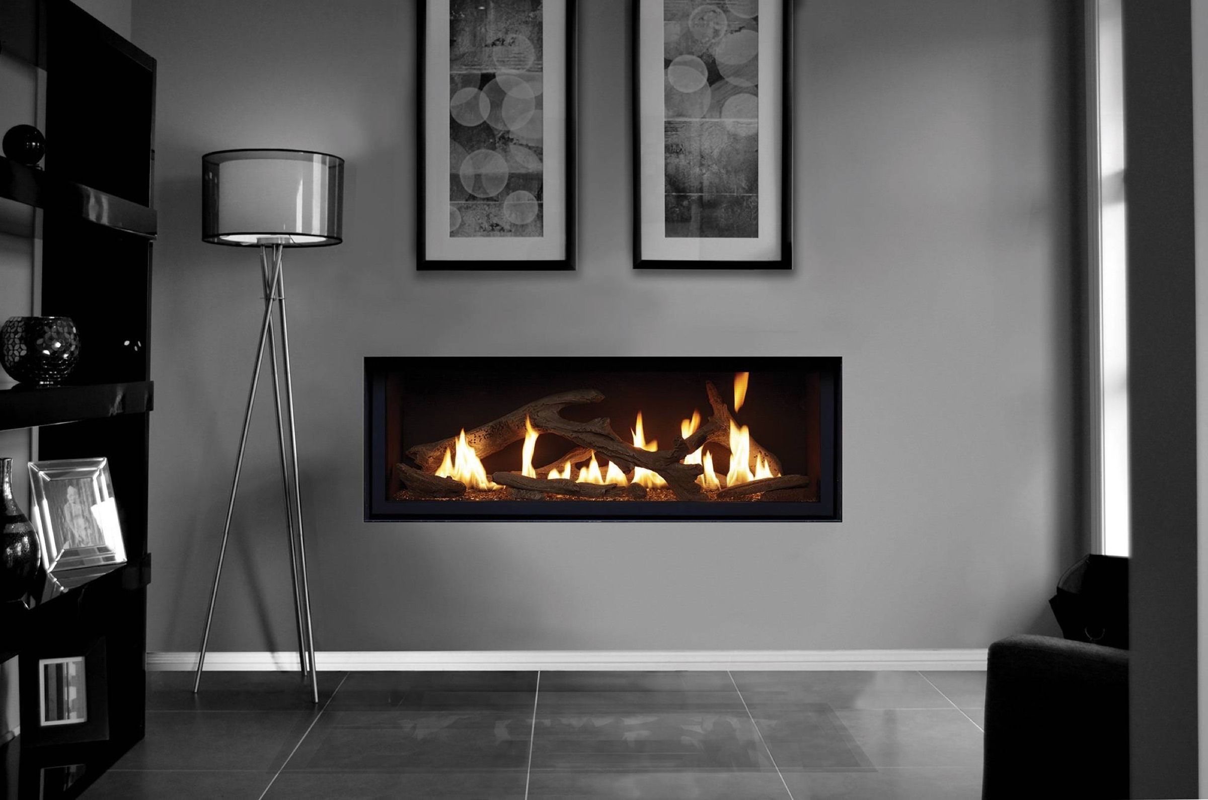 A small seating area with a modern fireplace design.