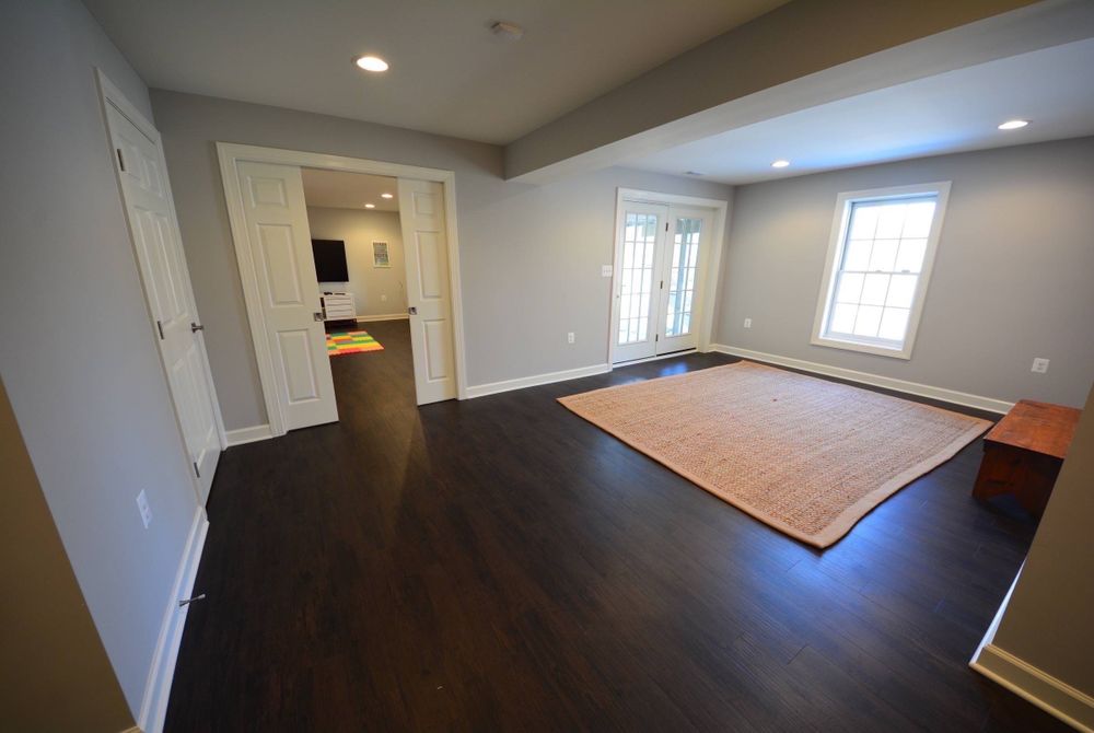 Vinyl plank is a great alternative to hardwood flooring. It remains durable through heavy use and pretty easy to clean.