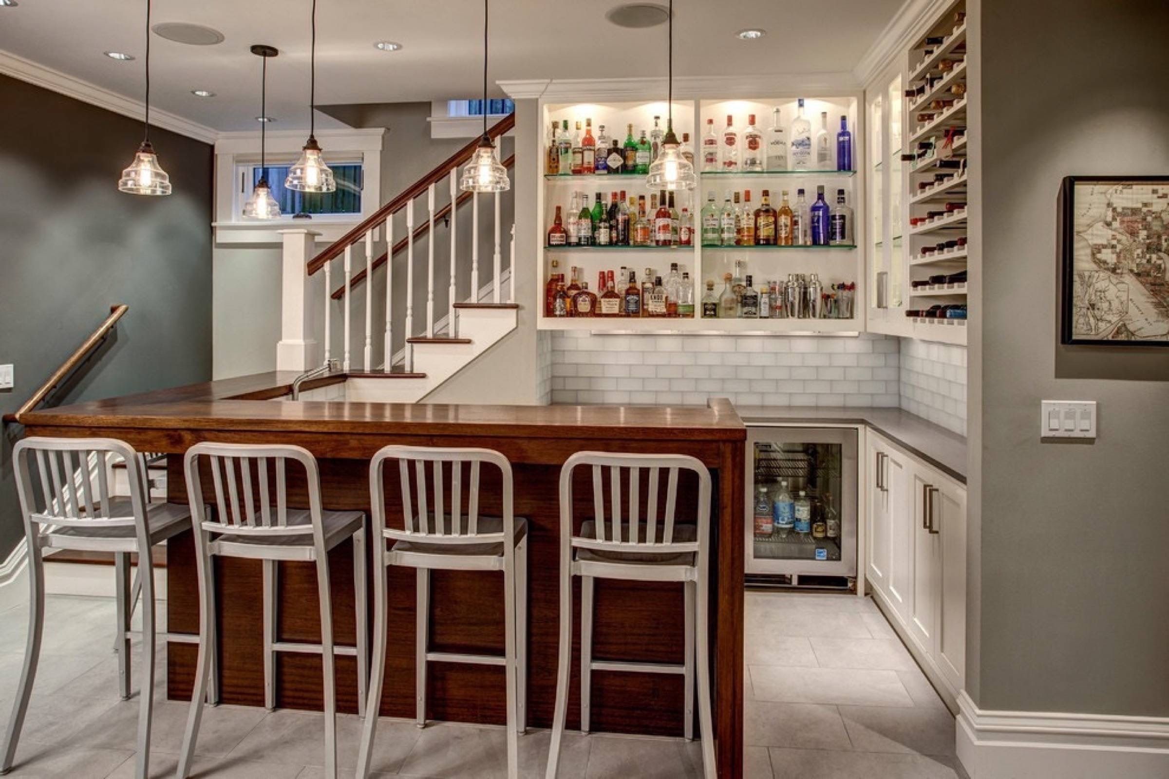 Open shelving wet bar designs are perfect for showcasing your spirits collection