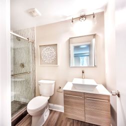 Basement Finishing - Beige Bathroom, White vanity, Mirror