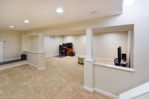 Basement Finishing With Columns And Hidden LED Lights