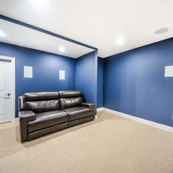 Basement Finishing - Traditional Home Theater, Beige Carpet