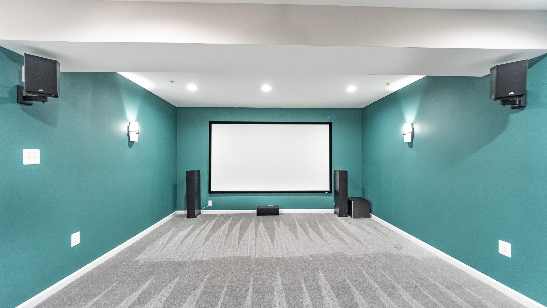 Traditional Basement with a Wetbar and Movie Theater Area