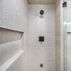 Basement design and remodeling with steam shower and home theater.