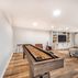 Welcoming basement finishing with beautiful built-ins and small wet-bar, Sykesville, MD 