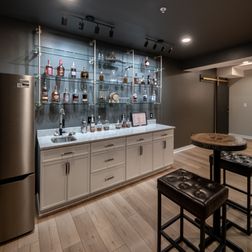 Stylish Basement Remodel with Wet Bar, Gym, and Lounge