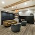 Modern Basement Remodel with Wet Bar, Fireplace, and Gym