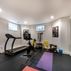 Modern Basement Remodel with Wet Bar, Fireplace, and Gym