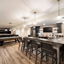 Modern Basement Remodel with Wet Bar, Lounge, and Gym