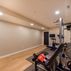 Stylish Basement Remodel with Wet Bar, Gym, and Lounge