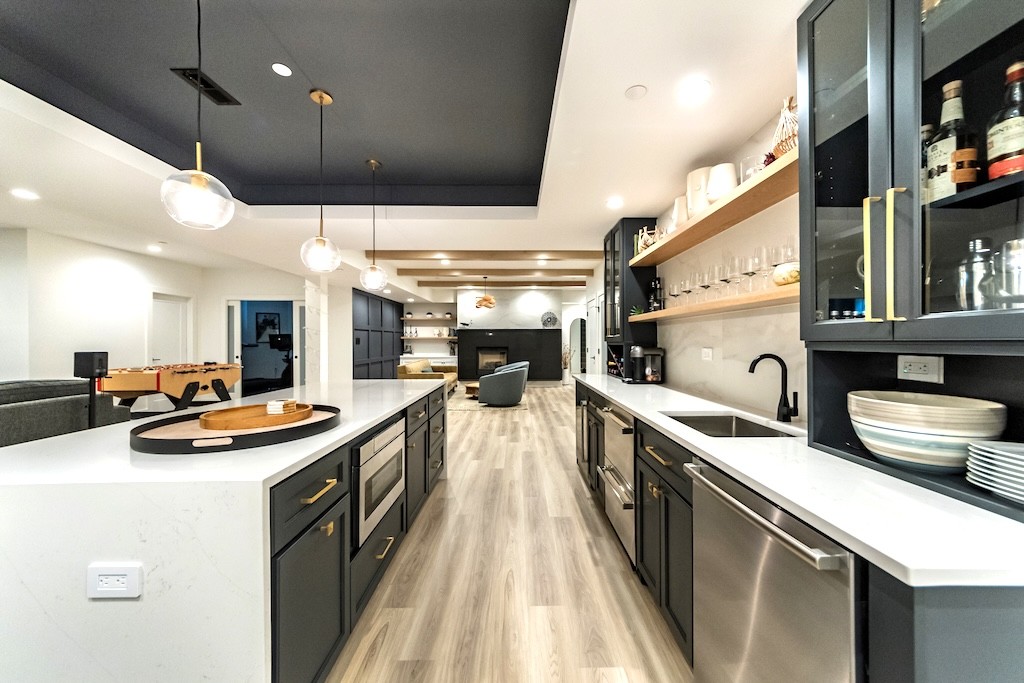Modern Basement Remodel with Wet Bar, Fireplace, and Gym