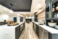 Modern Basement Remodel with Wet Bar, Fireplace, and Gym