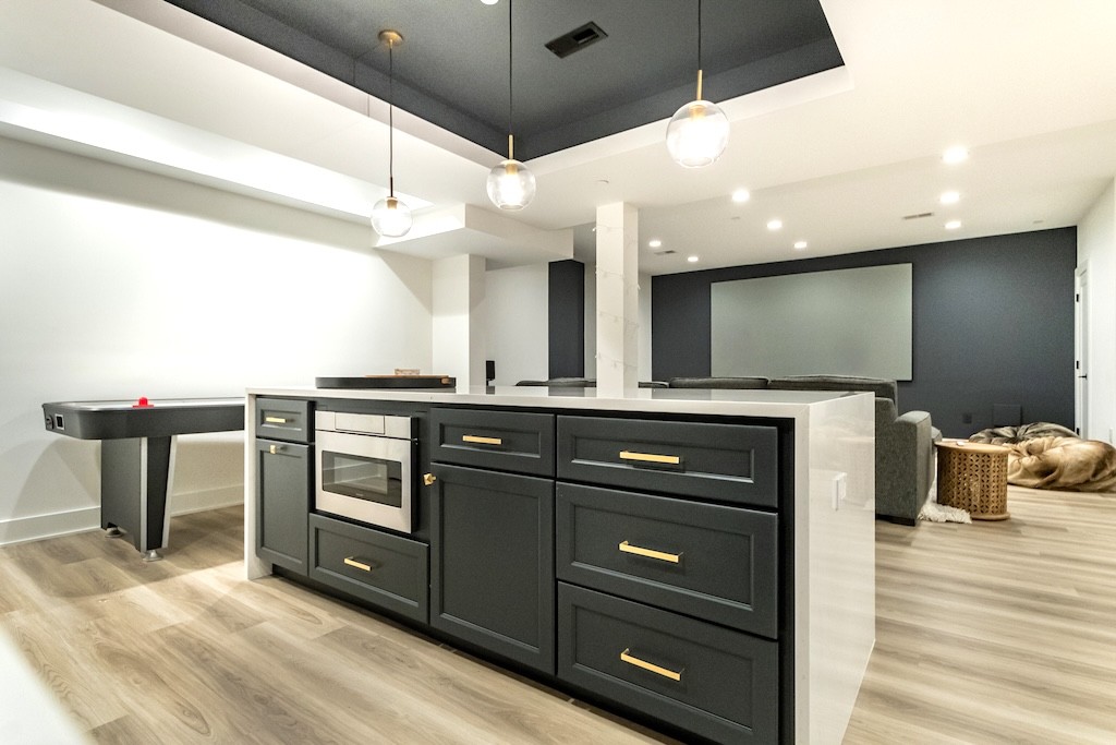 Modern Basement Remodel with Wet Bar, Fireplace, and Home Gym in ...