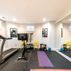 Modern Basement Remodel with Wet Bar, Fireplace, and Gym