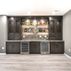 Elegant Basement Transformation with Built-In Bar and Functional Layout