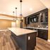 Modern Basement Design with Custom Wet Bar and Elegant Finishes