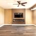 Modern Basement Design with Custom Wet Bar and Elegant Finishes