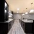 Sophisticated Basement Remodel with Stylish Wet Bar and Open Layout 