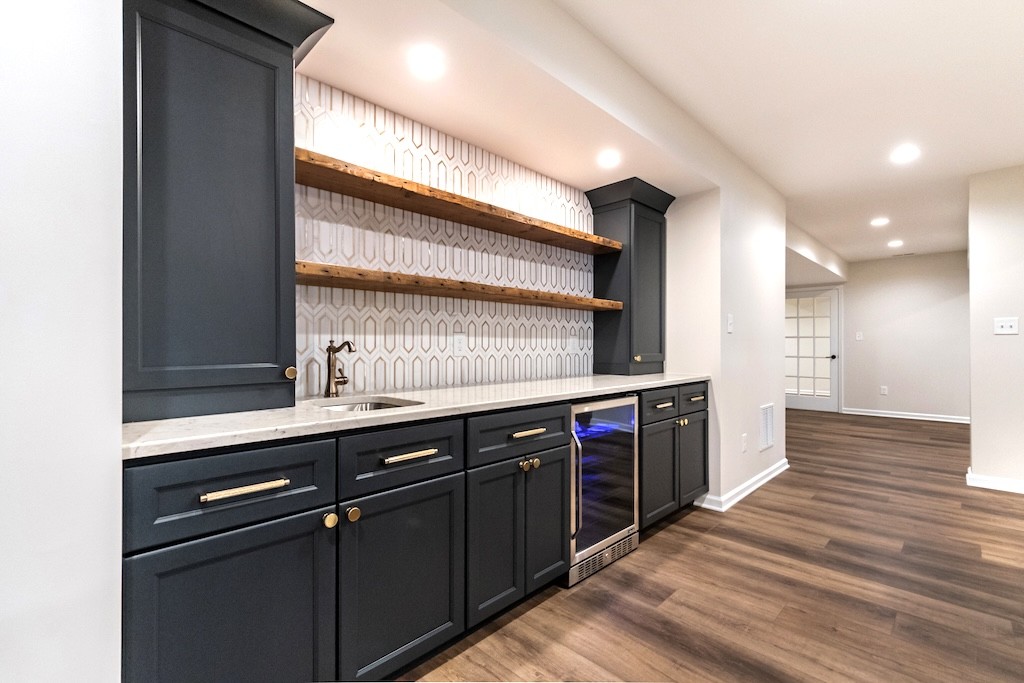 Stylish Basement Renovation with Custom Bar and Designer Bathroom