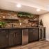 Stylish Basement Remodel with Cozy Entertainment Area and Rustic Wet Bar