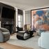 Sophisticated basement retreat with a marble-topped bar and a moody stone fireplace in Lutherville, MD, Lutherville, MD