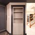 Sophisticated basement retreat with a marble-topped bar and a moody stone fireplace in Lutherville, MD, Lutherville, MD