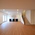 A 1,336 sq. ft. basement renovation with a stacked-stone fireplace, custom wet bar, and private suite, Fairfax, VA