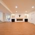 A 1,336 sq. ft. basement renovation with a stacked-stone fireplace, custom wet bar, and private suite, Fairfax, VA