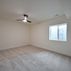 A 1,336 sq. ft. basement renovation with a stacked-stone fireplace, custom wet bar, and private suite, Fairfax, VA