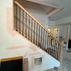 A 1,336 sq. ft. basement renovation with a stacked-stone fireplace, custom wet bar, and private suite, Fairfax, VA