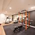 Herringbone-tiled bathroom, wet bar, bedroom and home gym, Rockville, MD