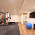 Herringbone-tiled bathroom, wet bar, bedroom and home gym, Rockville, MD