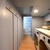 Built-in TV/pantry storage, half bath and laundry area., Bethesda, MD