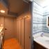 Built-in TV/pantry storage, half bath and laundry area., Bethesda, MD