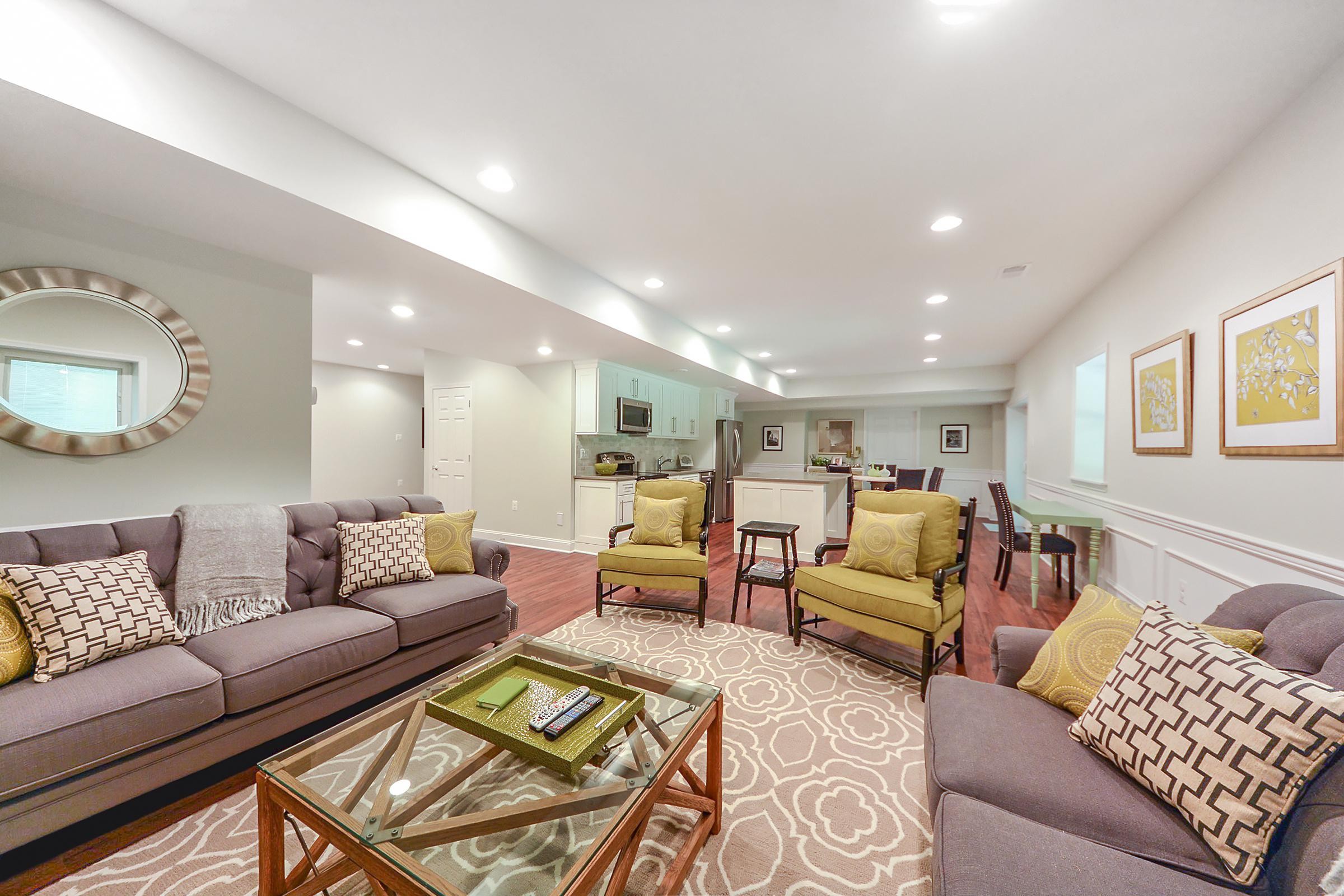 Basement Remodeling - Spacious Family Room with Fireplace and Kitchenette