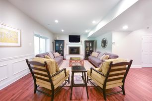 Basement Remodeling - Spacious Family Room with Fireplace and Kitchenette